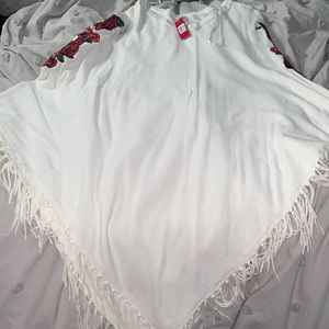 white poncho with roses